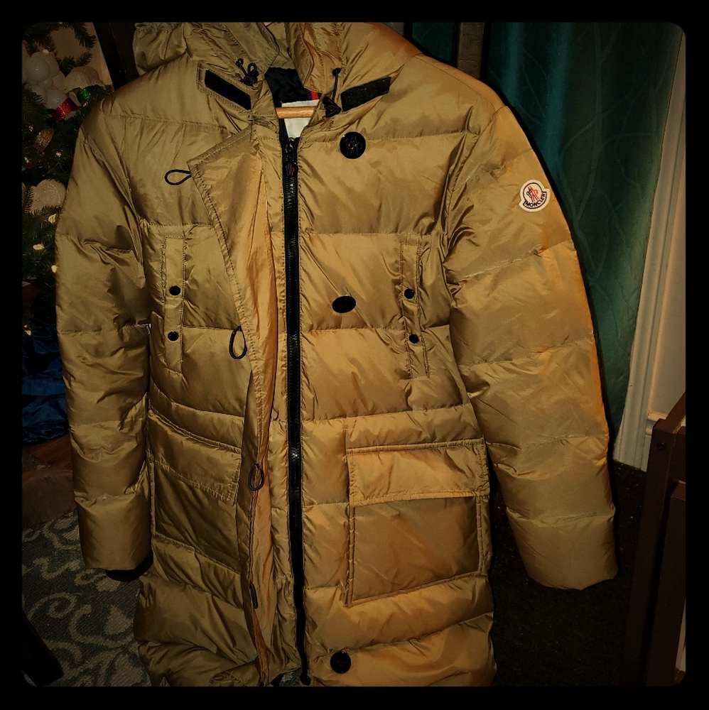 Moncler green full length jacket.
